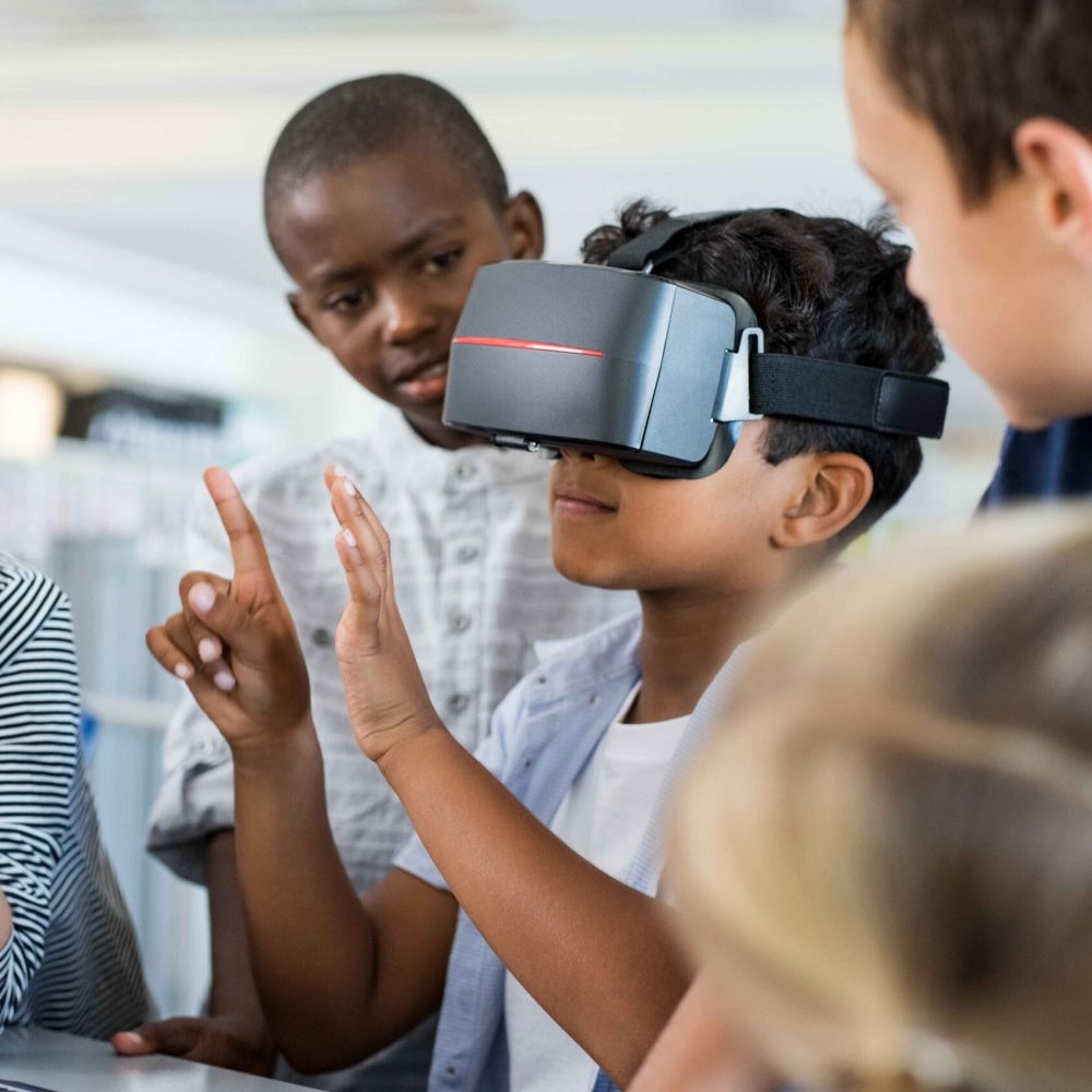 Boy using virtual goggles